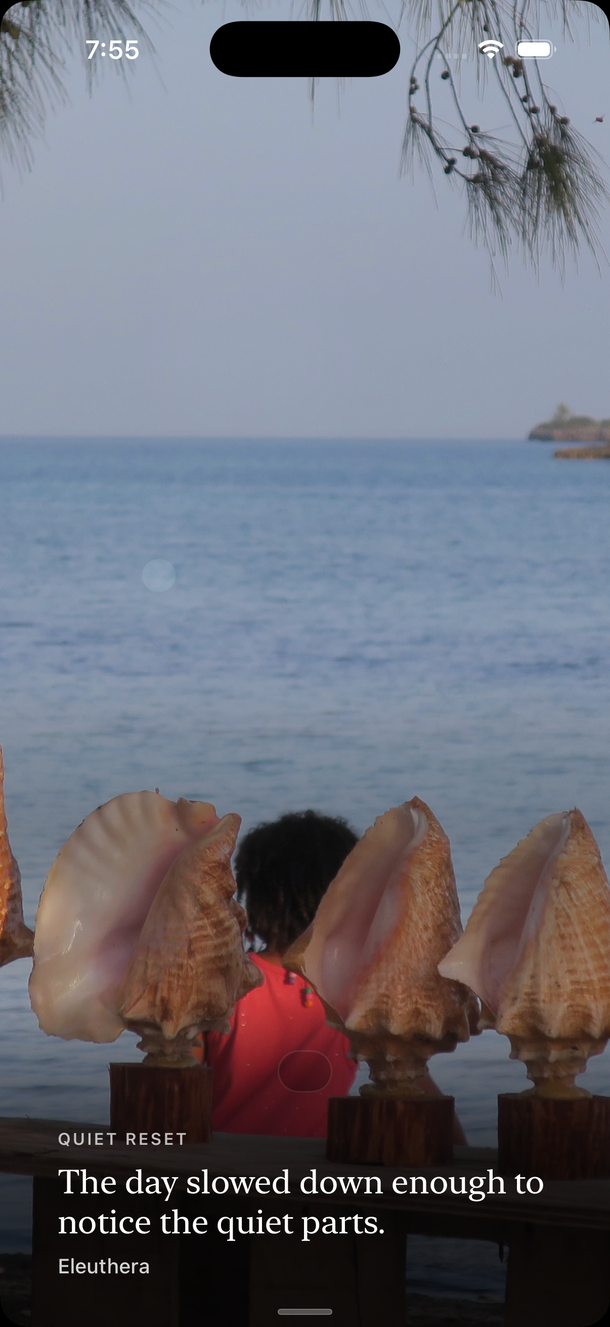 VacationOS widened further to an earlier journey: a quiet Eleuthera shoreline with conch shells on a rail, captioned Quiet Reset.